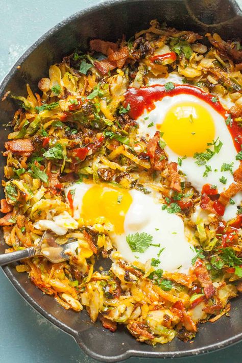 This simple Brussels Sprouts breakfast skillet has some amazing fall flavors and is my new favorite take on hash. I cook mine in a cast iron skillet with potatoes, bacon, and eggs! Dig in. | macheesmo.com #breakfast #skillet #easyrecipes #brusselssprouts Avocado Pancakes, Brussels Sprouts And Bacon, Egg Breakfast Recipes Easy, Sprouts And Bacon, Potatoes And Eggs, Breakfast Skillet Recipes, Diet Salad Recipes, Crispy Brussels Sprouts, Recipes With Eggs