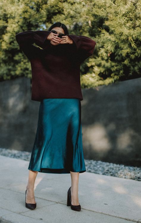 Winter Outfit Idea In A Satin Slip Midi Skirt Bias Skirt Outfit Winter, Teal Satin Skirt Outfit, Black Silk Skirt Outfit Summer, Black Satin Skirt Outfit Summer, Blue Satin Skirt Outfit, Black Skirt Winter, Satin Skirt Outfit Winter, Satin Skirt Outfit Summer, Slip Dress Outfit Winter