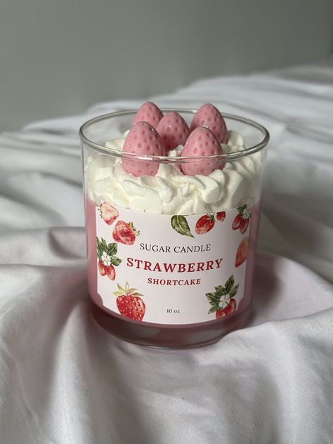 Strawberry Shortcake Candle! This candle will provide a unique experience for strawberry enthusiasts. Our handmade candle is carefully crafted with a blend of high-quality soy wax and premium fragrance oils. Each burn offers a delightful experience reminiscent of a lively strawberry shortcake. Cozy Moments "Enrich or give as a gift to someone special. Decorate your home." Feel the sweetest moments you've ever experienced now. Pamper yourself or someone you love with the essence of Strawberry Shortcake today! 🎁 Follow us on Instagram for exclusive deals: www.instagram.com/sugar.candle.co  For more handcrafted products, visit www.etsy.com/shop/mysugarcandle Thank you for choosing our candles! 💖 Made in USA  Important Information: Candle Weight: 10 oz Handcrafted, sizes and designs may vary Velas Aesthetic, Candle Obsession, Soya Mumu, Sweet Candles, Holiday Candle, Food Candles, Gift Inspo, Cute Candles, Aesthetic Candles