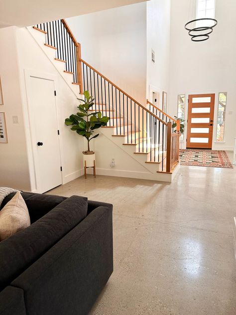 Cement Floors In House Diy, Cement Floor Interior, Concrete Floor Entryway, Homes With Cement Floors, Interior Cement Floors, House With Concrete Floors, Concrete Floors With Wood Trim, Barndominium Cement Floors, Cement Floors In House