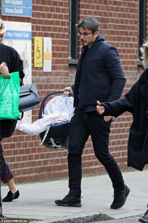 New dad: Josh Hartnett was pictured following partner Tamsin Egerton out of a London hospital on Monday afternoon carrying their newborn child Tamsin Egerton, Social Norms, New Father, Josh Hartnett, Aiden Turner, New Fathers, Celebrity Babies, Famous Men, Celebrity Street Style