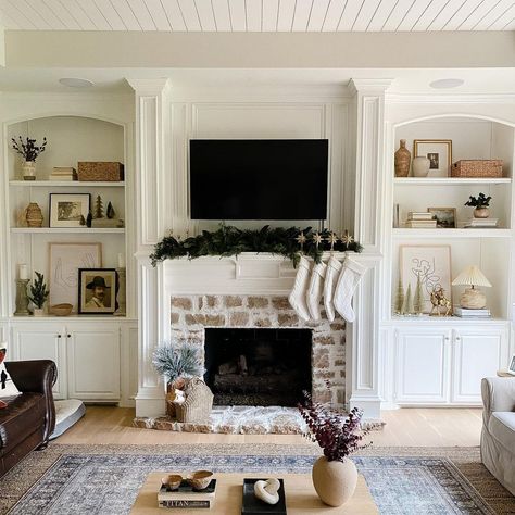 White Fireplace Built In Shelves, Fireplace With Rounded Built Ins, Shelfs On Side Of Fireplace, Recessed Built Ins Around Fireplace, Rock Fireplace With Built Ins On Both Sides, Built In Shelves By Fireplace, Fireplace Built Ins Decor, Fireplace Mantle With Built Ins, Stone Fireplace And Built Ins