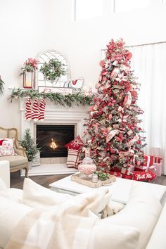 Christmas Trees And Mantels, Flocked Red And White Christmas Tree, Classic Red And White Christmas Tree, Red And White Rustic Christmas Tree, Red Gold Flocked Christmas Tree, Great Room Christmas Decor, Red White And Tan Christmas Tree, Cream And Red Christmas Tree, Red And White Fireplace Christmas Decor