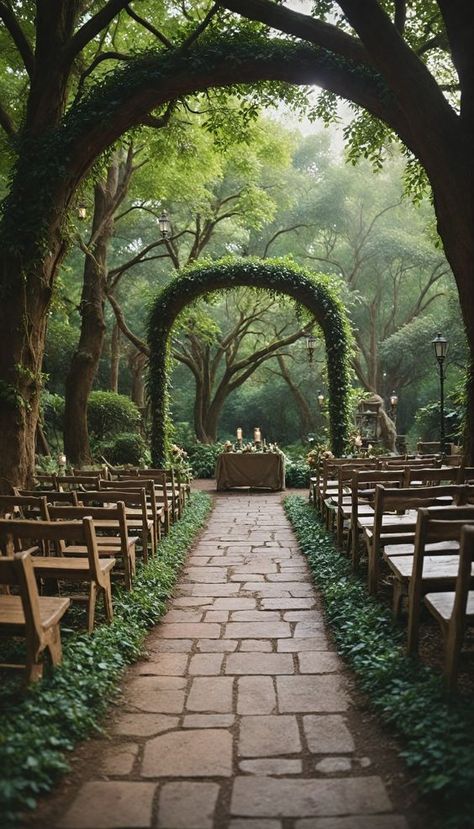 Enter a fairytale with this enchanting forest wedding setup. Ivy-covered archways, lanterns, and a mossy aisle create a magical scene. #ForestWedding #FairytaleWedding #WeddingInspiration #OutdoorWedding #ElegantWeddings #AIgenerated" Frog Wedding, Cottage Core Wedding, Marriage Venues, Elvish Wedding, Forest Fairytale, Wedding Setup, Forest Theme Wedding, Daytime Wedding, Enchanting Forest