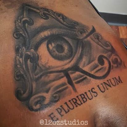 Awesome black and grey mystic eye E Pluribus Unum male stomach tattoo by Kevin Soto. E Pluribus Unum Tattoo, Male Stomach, Stomach Tattoo, Patriotic Tattoos, Mystic Eye, Flag Tattoo, Stomach Tattoos, Body Art Tattoos, Tattoos For Guys