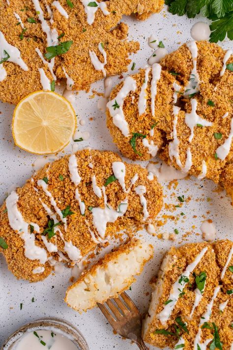 These crispy breaded cauliflower steaks make for the perfect vegan holiday entree! They're easy to prepare and ready in about an hour! #vegan #cauliflowersteak #vegansteak #veganthanksgiving #veganchristmas #veganentree Vegan Breaded Cauliflower, Panko Crusted Cauliflower Steaks, Crispy Cauliflower Steaks, Breaded Cauliflower Steaks, Breaded Cauliflower Baked, Cauliflower Steaks Baked, Fried Cauliflower Steaks, Vegan Cauliflower Steaks, Breaded Cauliflower