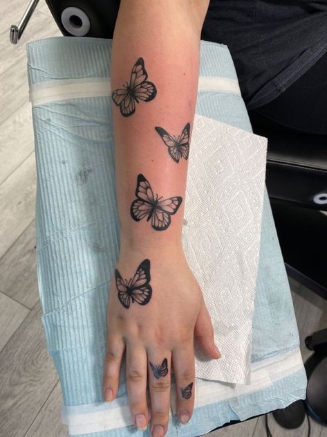 Butterfly Tattoos On Arm For Women, Butterflies Tattoo On Hand, Butterfly Up The Arm Tattoo, Butterfly Flying Up Arm Tattoo, Butterflies On Wrist Tattoo, Hand Butterflies Tattoo, Butterfly Tats On Arm, Arm Butterflies Tattoo, Butterfly Around Arm Tattoo