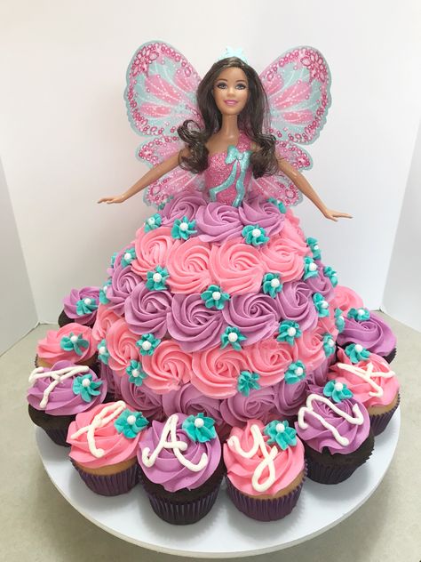 Barbie Cake | Birthday Cake | Pink and Purple | Sorby Sweets | Rosettes | Dress Cake Barbie Cake Cupcakes, Barbie Cake And Cupcakes, Barbi Cakes, Dress Cake Birthday, Barbie Dress Birthday Cake, Barbie Cake Dress, Easy Barbie Cake, Dress Cake Ideas, Black Barbie Cake