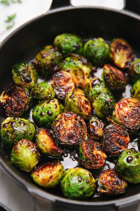 Roasted Brussels Sprouts with Balsamic Glaze in a cast-iron pan Cast Iron Brussel Sprouts, Brussel Sprouts With Balsamic Glaze, Balsamic Glazed Brussel Sprouts, Roasted Brussel Sprouts With Balsamic, Honey Balsamic Brussel Sprouts, Brussel Sprouts Roasted, Balsamic Glaze Brussel Sprouts, Pan Roasted Brussel Sprouts, Roasted Brussels Sprouts With Balsamic