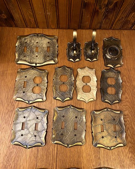 "Vintage brass light switch and outlet covers, designed by Amerock. Featuring a handsome leather-like texture in solid brass, circa the 1970s-80s. Please choose your quantity and style at checkout. Please note that they do not come with screws. CSA approved. They measure: Triple switch cover are 5.75 by 6.75\" across Double switch/outlet covers are 5.75\" by 4.75\" across Single switch/outlet covers are 5.75\" by 3.75\" across. Coat Hanger is approx. 4\" tall. Shipping out side of the continental USA, rural or eastern Canada can be more expensive and could be require additional payment. You can send me your shipping address in advanced for a quote. Please Note: The items I sell are not new, they are vintage or antiques, it goes without saying that there maybe some imperfections which I wil Vintage Lightswitch Cover, Antique Light Switch Covers, Brass Light Switch Covers, Vintage Outlet Covers, Brass Light Switch, Vintage Light Switches, Outlet Plates, Brass Light, Eastern Canada