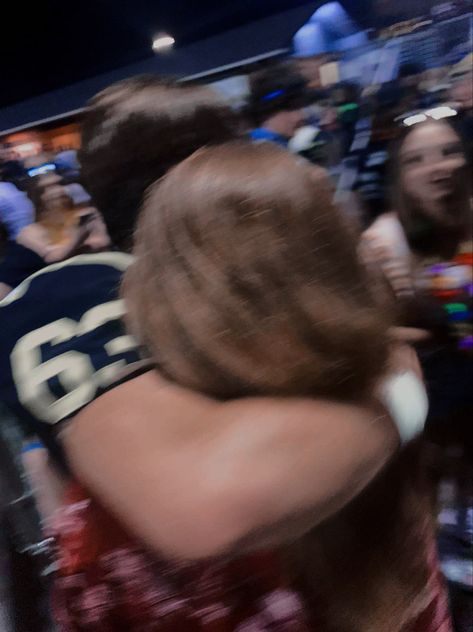 blurry picture of a football player hugging a girl Wally Clark Aesthetic, Hs Football Aesthetic, Rugby Boyfriend Aesthetic, Football Bf Aesthetic, Couple Playing Football Aesthetic, Football Boy Aesthetic, Cheerleader Girlfriend Aesthetic, Rugby Girlfriend Aesthetic, Football Player Aesthetic