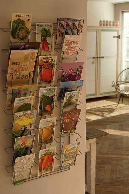 Love the way this postcard collection is displayed. Wonderland House, Postcard Holder, Postcard Display, Student Lounge, Ceramic Store, Magnet Board, Postcard Collection, Travel Souvenirs, House Tour