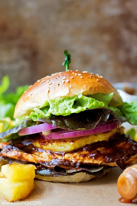 Loaded with juicy grilled pineapple, red onion and crisp lettuce, this Hawaiian BBQ Chicken sandwich is perfect for summer entertaining! Hawaii Bbq, Hawaiian Chicken Sandwich, Hawaiian Bbq Chicken, Bbq Chicken Sandwiches, Bbq Chicken Sandwich, Hawaiian Bbq, Lil Luna, Bbq Burgers, Hawaiian Chicken