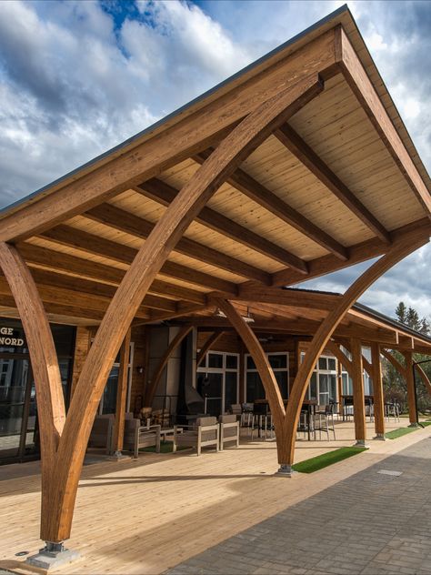 Timber construction by Art Massif Wood Structure. Expansion of the outdoor space by adding a magnificent pergola to create a covered rest area that can be transformed into a ceremony place. Photo credit : Patric Nadeau Photographie Wood Structure Detail, Wood Construction Architecture, Wooden Structure Architecture, Timber Structure Architecture, Wood Structure Architecture, Glulam Structure, Timber Canopy, Wood Roof Structure, Wooden Arches