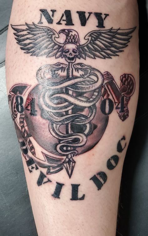 This is the Cadeuces with the Marine Corps EGA and 8404 Devil Doc added. Navy Corpsman Tattoo, Corpsman Tattoo, Us Navy Tattoos, Navy Boot Camp Graduation, Hospital Corpsman, Navy Hospital Corpsman, Navy Tattoos, Navy Corpsman, Boot Camp Graduation