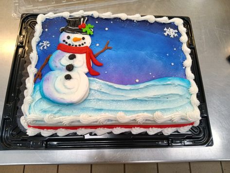 A 1/4 sheet cake iced in buttercream, decorated with a winter scene and snowman Snowman Sheet Cake, Winter Scene Cake, Winter Sheet Cake, Christmas Sheet Cake Ideas, Christmas Sheet Cake Designs, Buttercream Sheet Cake, Christmas Desserts Cakes, Dq Cakes, Winter Cakes