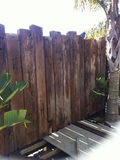 Railway Sleepers Fence, Reclaimed Wood Fence Ideas, Railway Sleeper Fence, Sleeper Fence, Garden Screening Ideas, Reclaimed Railway Sleepers, Screening Ideas, Creating A Garden, Jungle Style