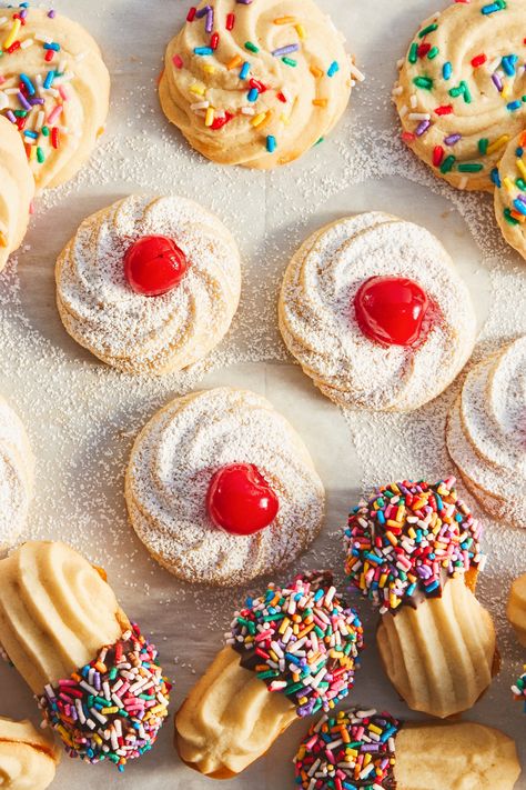 If you’ve ever been to an Italian bakery, you’ve probably seen Italian butter cookies. They come in various shapes—swirls or cat’s tongues—and everyone has their favorite. All of the variations start with the same base dough: intensely buttery, warm from a generous splash of vanilla, and tender from a combination of powdered and granulated sugars. Then you can choose your own adventure with the toppings and flavors. Here's how to make homemade Italian butter cookies. Italian Butter Cookies Recipe, Bread Decoration, Sprinkle Cookies Recipe, Italian Butter, Italian Butter Cookies, Butter Cookie Recipe, Turtle Cookies, Italian Bakery, Cherry Cookies