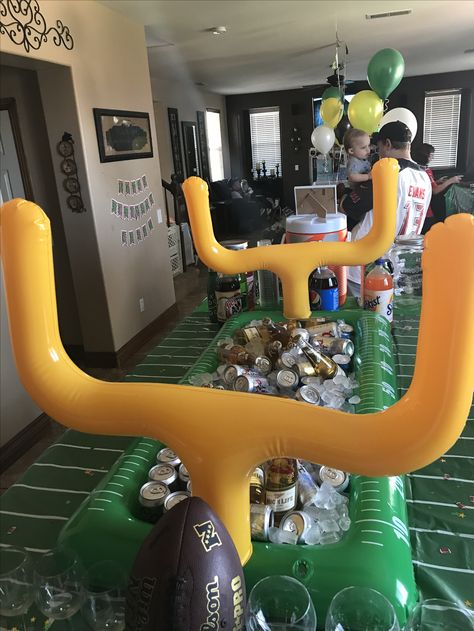 Inflatable pool for drinks. First birthday football theme. Football Sunday Birthday, 30th Birthday Sports Theme, Football Theme Bday Party, Football Birthday Centerpiece Ideas, 30th Football Birthday Party, Sweet 16 Football Theme, Madden Football Birthday Party, Football 30th Birthday Party, Eagles Theme Birthday Party