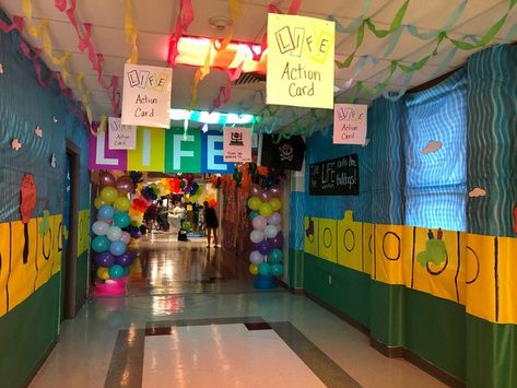 Game of Life homecoming hallway Neon Hallway Ideas School, School Hallway Themes Ideas, Game Of Life Hallway Decorations, The Game Of Life Decorations, Highschool Hallway Decorations, High School Hallway Decorations, Board Game Hallway Decorations, School Hallway Themes, Game Of Life Decorations