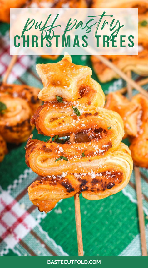 A four-ingredient recipe for puff pastry Christmas trees. Slathered in red or green pesto and sprinkled with Parmesan cheese, these puff pastry trees are an easy-to-make appetizer for cocktail parties and holiday celebrations. Pesto Cheese Christmas Tree, Pastry Puff Christmas Tree, Puff Pastry Recipes For Christmas, Pesto Puff Pastry Christmas Tree, Puff Pastry Side Dish, Puff Pastry Christmas Trees, Puff Pastry Tree Christmas, Puff Pastry Christmas Tree Appetizer, Puff Pastry Christmas Recipes