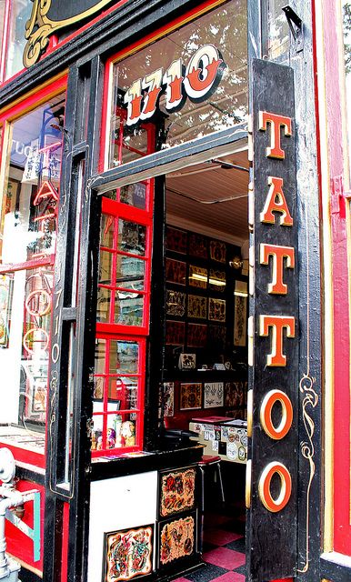 tattoo parlor window pictures | tattoo parlor door Tattoo Shop Front Window, Traditional Tattoo Shop Interior, Tattoo Shop Aesthetic Grunge, Tattoo Shop Pictures, Vintage Tattoo Shop Aesthetic, Tattoo Shop Exterior, Door Tattoo Ideas, Tattoo Parlor Interior, Tattoo Parlor Aesthetic