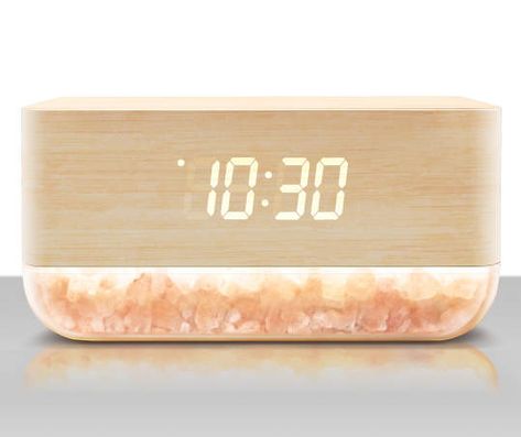 Wake up to the relaxing view of a simulated sunrise using this stylish clock. Designed with a wood print on top, the clock emits orange light from natural Himalayan salt, diffusing through the crystal to help you rise. Offering the time and temperature through warm LEDs, this alarm clock is an elegant statement for a nightstand. Alarm Clock Boho, Himalayan Salt Alarm Clock, Nightstand Clock, Sunrise Alarm Clock Aesthetic, Alarm Clock Cute, Sunlight Alarm Clock, Sun Light Alarm Clock, Rose Gold Alarm Clock, Study Makeover