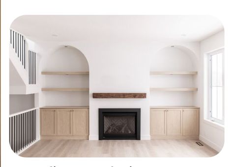 Arched Alcoves Living Room, Arched Built Ins Living Room Fireplace, Spanish Style Built Ins, Lounge Room Shelving Ideas, Arches Next To Fireplace, Arch Entertainment Center, Living Room With Built In Shelves, Arch Media Wall, Arch Built In Shelves Fireplace