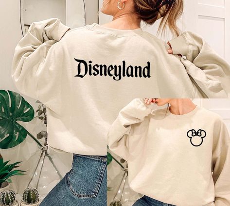 [U.S. FREE SHIPPING] Stunning Disneyland Crewneck Sweatshirt Own it today! Multiple colors available Ideal for any situation, a unisex heavy blend crewneck sweatshirt is pure comfort. These garments are made from polyester and cotton. The collar is ribbed knit, so it retains its shape even after washing. There are no itchy side seams on these sweaters. .: 50% Cotton 50% Polyester .: Medium-heavy fabric .: Loose fit .: Sewn in label .: Runs true to size Crew Neck Sweatshirt Disney, Family Disney Sweatshirts, Disney Sweat Shirts, Disney Hoodies For Women, Disneyland Christmas Outfit, Disney Gifts For Adults, Disneyland Sweatshirt, Disney Trip Outfits, Surprise Vacation