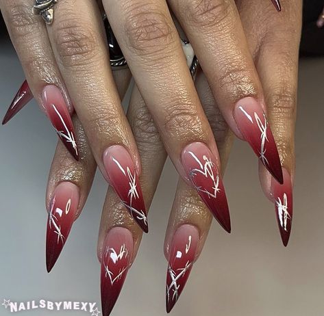 Dark Stilleto Nails Design, Dark Red Almond Nails Designs, Pointy Nail Designs Stilettos, Red Nail Designs Classy Almond, Red And Chrome Nails, Red Stilletos Nails, Stylish Nails Red, Red Airbrush Nails, Dark Red Nails Acrylic