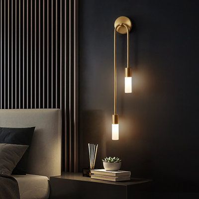 Featuring a brass gold finish and white frosted shade, this 2-lights wall sconce perfectly matches contemporary, minimalist, Scandinavian, industrial, luxe, mix-and-match styles, and more. Orientation: Left | Mercer41 Kisara 2 - Light Solid Brass Armed Sconce Glass / Metal in Pink / White / Yellow | 22 H x 3.5 W x 3.15 D in | Wayfair Scones Bedroom Ideas, Modern Bedroom Sconces Bedside, Boho Sisustus, Plain Wall, Silver Decor, Elegant Bedroom, Creative Wall, Led Wall Lamp, Gold Decor