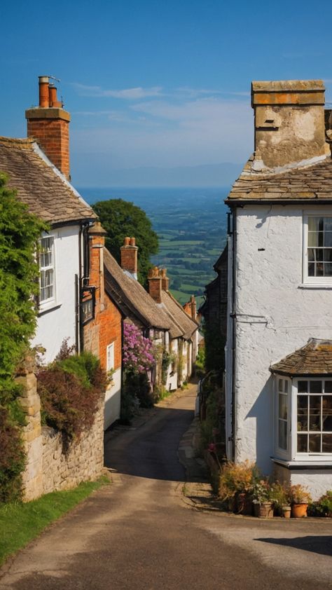 Explore the charming English village with its quaint cottages old houses small church and picturesque landscapes Immerse yourself in the aesthetic life of this historic community filled with beautiful paintings stunning house interiors and unique architectural details Indulge in the cozy atmosphere of a traditional English pub as you soak in the timeless beauty of this idyllic setting Ideal for those who appreciate the aesthetic and serene charm of a classic English village Old Stone Cottage, Village Ideas, English Pub, Elephant Pictures, Quaint Cottage, English Village, Thatched Cottage, Aesthetic Life, Thatched Roof