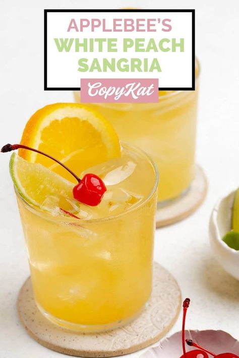 Applebees White Peach Sangria Recipe, White Wine Sangria Peach, Strawberry Peach Sangria, Peach Sangria Recipe, Peach Sangria Recipes, Applebees Recipes, Fruity Cocktail Recipes, Shots Alcohol Recipes, White Peach Sangria