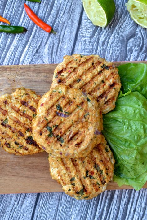 These Mexican Chicken Burgers are so flavourful! The chicken patties are packed with cilantro, jalapeno, lime and Mexican spices and are served with salsa and guacamole. Serve these burgers on a grilled sliced of butternut squash to make them Whole30, Paleo, Grain Free, Gluten Free & Keto! Chicken Burger Patties, Ground Chicken Recipes Healthy, Chicken Patty Recipes, Mexican Burger, Ground Chicken Burgers, Salsa And Guacamole, Chicken Burgers Recipe, Cilantro Chicken, Salsa Guacamole