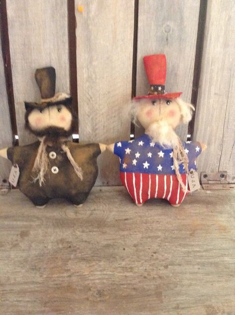 This wonderful pattern will make 11 to 12 inch dolls a easy to follow instructions Snowman Hat Pattern, Peg Hanger, Patriotic Doll, Table Topper Patterns, Primitive Americana, Abe Lincoln, Primitive Patterns, Primitive Santa, Plaid Quilt