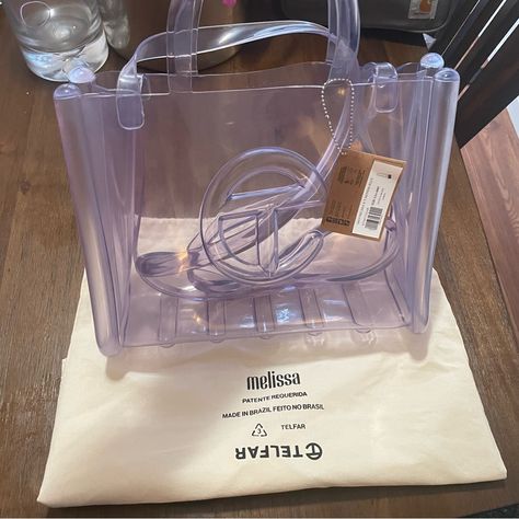 This Is Hands Down The Festival Bag Of The Year!!! Melissa Collab By Telfar. 100% Authentic. Size Medium. Dimensions Listed Above. I Am Also Selling In Separate Postings: Pink Melissa X Telfar Jelly Shopper Large Clear Melissa X Telfar Jelly Slides M9/W10.5 Or 11 Silver Metallic Telfar Shopping Bag Medium Gold Metallic Telfar Shopping Bag Medium Clay Mask Art, Telfar Shopping Bag, Purse Collection, Jelly Slides, Mask Art, Jelly Bag, Marc Jacobs Tote, Festival Bag, Girl Things