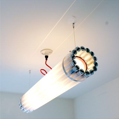 Light made from recycled ﬂuorescent tubes, powder coated steel and stainless steel banding and cable. Blitz Design, Fluorescent Tube Light, Tube Lamp, Linear Pendant Light, Pendant Light Design, Fluorescent Tube, Tube Light, Led Lampe, Lamp Design