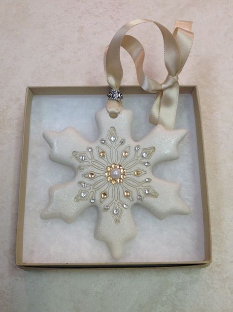 "* Handmade 3 7/8\" x 3 7/8\" polymer clay snowflake ornament.   * This ornament hangs from a satin ribbon, is embellished with an ink stamp and decorated with acrylic/glass gems and pearls. * This is an elegant ornament which can also be used as a wall hanging or wine bottle charm. * It comes packaged in a 4\" x 4\" gift box as shown in the picture, which makes it a beautiful gift on it's own or a nice size to include a gift card as well. *  Makes a great teacher gift, hostess gift or employer Polymer Clay Ornaments Christmas, Clay Ornaments Christmas, Salt Dough Christmas Ornaments, Clay Christmas Decorations, Clay Christmas, Polymer Clay Ornaments, Christmas Clay, Clay Crafts Air Dry, Polymer Clay Christmas