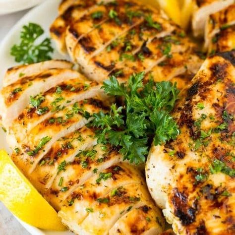 Greek Lemon Chicken - Dinner at the Zoo Grilled Lemon Herb Chicken, Grilled Lemon Pepper Chicken, Grilled Lemon Chicken, Salad Appetizer Cups, Lemon Chicken Pasta, Grilled Lemon, Inexpensive Dinners, Fast Meals, Chicken Tikka Masala Recipes