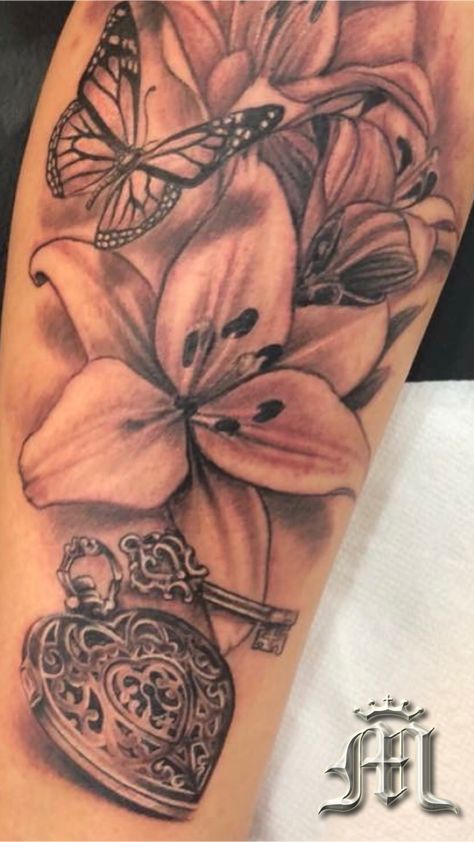 Woman’s arm tattoo. Flower, butterfly, heart locket Tattoo by Big G. #miamibeach #miamitattoos #miamitattooco Big Heart Tattoos For Women, Locket Tattoos For Women, Arm Tattoo Flower, December Flower Tattoo, Heart Locket Tattoo, Heart Flower Tattoo, Locket Tattoos, Anniversary Tattoo, Pearl Tattoo