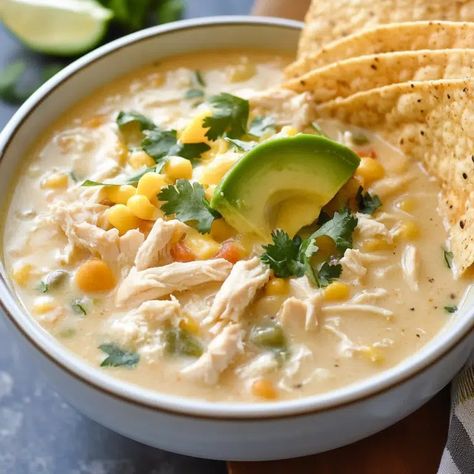 Creamy Crockpot White Chicken Chili Recipe - cookingwithsandra.com Crockpot Poblano White Chicken Chili, Chicken Bean Chili Crockpot, Crock Pot Chicken Chilli, White Chicken Chili Slow Cooker No Dairy, Creamy Chicken Chili Crockpot, White Chile Chicken, White Chicken Chili Slow Cooker Easy Crock Pot, White Chili Chicken Recipe Crockpot, White Chicken Chili Crockpot Recipes