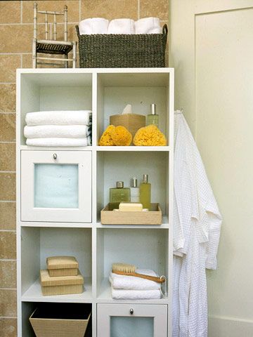 Storage Cubes- A simple cube storage unit, commonly used in home offices, can be an inexpensive way to add extra storage. Adapt a standard piece to be more bathroom-friendly by adding towel hooks and frosted cabinet doors. Ikea Cubes, Bathroom Storage Ideas, Cube Storage Unit, Storage Cubes, Small Bathroom Storage, Towel Storage, Bath Storage, Cube Storage, Bathroom Toilets