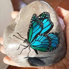 painted rock butterfly art by Tunde Fodor of RockStreet Collective Rock Butterfly, Diy Painted Rocks, Butterfly Ideas, Animals Butterfly, Artist Of The Month, Butterfly Art Painting, Painted Rock Animals, Blue Rock, Stone Art Painting