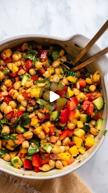 From My Bowl | by Caitlin S on Instagram: "Let’s do Lunch ep 10 | Mango Chickpea Salad 🥭This Indian-Inspired recipe (inspired by Chana Chaat) is SO FREAKING GOOD, I actually think it might just be the best thing I’ve ever made 🤭

This recipe is packed with protein and fiber-rich chickpeas, juicy mango, crunchy bell peppers, and refreshing cucumbers for the ultimate flavor and texture combination. But it’s the sweet and tangy tadka-infused dressing that takes this crunchy, creamy salad from tasty to absolutely delicious!

Ge the full recipe on From My Bowl and follow @frommybowl for more satisfying plant-based eats 🧡" Texture Combination, Broccoli Pasta Salads, Creamy Salad, Pasta Salads, Chickpea Salad, Fiber Rich, Indian Inspired, Plant Based Eating, Bell Peppers