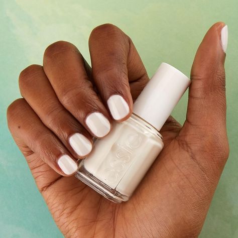 Essie "Marshmallow" on brown skin.  White nail polish on brown skin. Nail polish on brown skin. Brown skin swatches.  | @essie