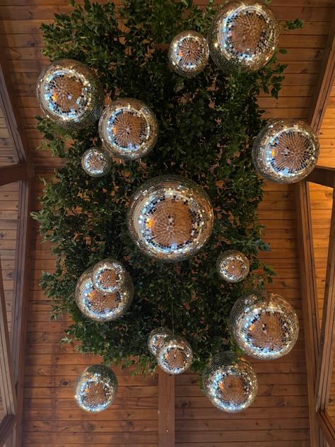 Green Disco Party, Greenery And Disco Balls, Disco Ball Decor Ideas, Ceremony Flowers Altar, Disco Ball Ceiling, Disco Christmas, Christmas Fireplace Mantels, Thistle Wedding, Edgy Bridal