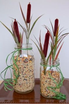 Ideas for some small things to have at coat check/sign in? its pretty much just mason jars and bird seed, so not too hard to do:) Ducks Unlimited Banquet Decor, Beet Centerpiece, Fall Family Reunion Ideas, Cajun Party Decorations, Shrek Centerpieces Party Ideas, Cattail Centerpieces, Bayou Party, Duck Dynasty Party, Registration Table