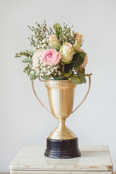 As seen on Wedding Chicks....  http://www.weddingchicks.com/2013/08/13/urban-vintage-inspirational-shoot/  trophy floral arrangement Kentucky Derby Decor, Fun Floral Arrangements, Bridal Dinner, Pink Flower Arrangements, Kentucky Derby Party, Melbourne Cup, Mint Wedding, Wedding Table Decorations, Wedding Chicks