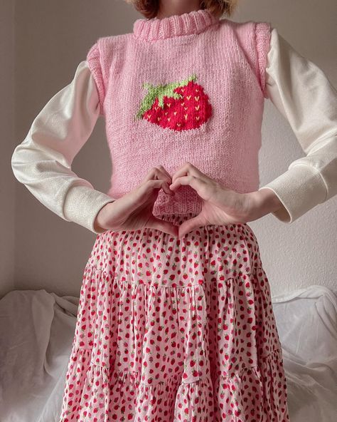 ⋆.˚𐙚❀ 🍓 strawberry sweater vest 🍓 ❀𐙚⋆.˚ Lately I’ve been really into knitting, especially sweater vests. I started this a few weeks ago on my trip to france and finished it on a rainy evening two weeks ago. 🌧️ In comparison to crocheting, knitting is a lot more repetitive and calming on the mind. I especially love the clicking of the knitting needles together. 🧶 #knit #knitting #fibreart #sweatervest #coquette #strawberry #cottagecore Strawberry Sweater Vest, Strawberry Cottagecore, Coquette Strawberry, Strawberry Sweater, Rainy Evening, Knitted Stuff, Trip To France, Knitted Baby Blanket, Fairy Dresses