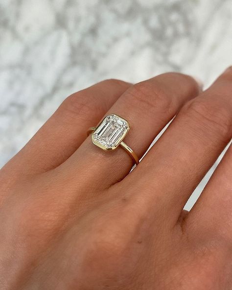 Eye-Catching Emerald Cut Engagement Rings ★ emerald cut engagement rings gold simple classic diamond Flush Fit Engagement Ring, Low Setting Emerald Engagement Ring, Organic Looking Engagement Rings, Embossed Engagement Ring, Square Art Deco Engagement Ring, Flush Ring Setting, Emerald Engagement Cut Ring, Simple Band Engagement Rings, Bevel Emerald Diamond Ring